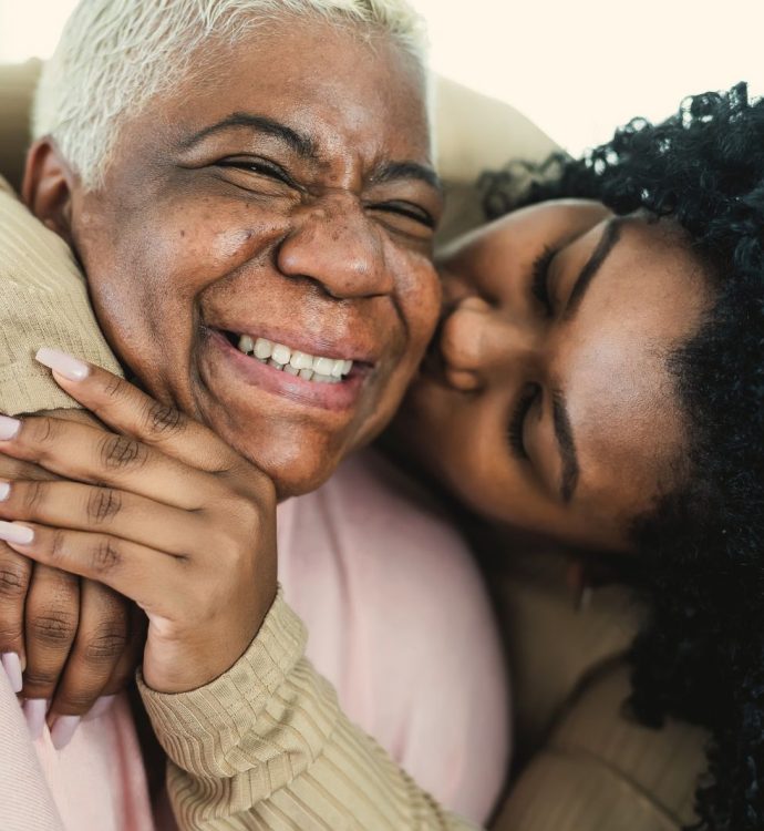 Joyful embrace between two people, highlighting love and happiness.