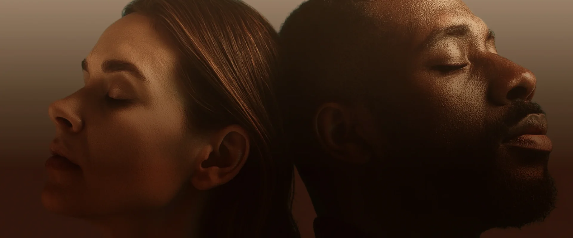 Back-to-back portraits of two people with eyes closed in warm lighting.