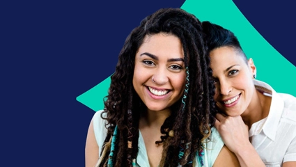 Two people smiling against a blue and teal abstract background.